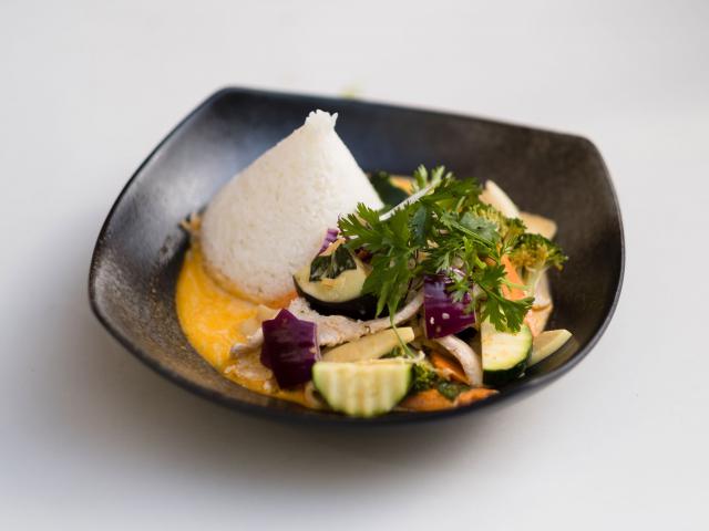 62. Thai curry chicken cooked in a clay pot